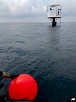 This is a photo of the floating home lived in by an American man and his Thai partner in the Andaman Sea, off Phuket island, Thailand, April 13, 2019, from the Royal Thai Navy.