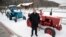 he Communist Party's candidate for the 2018 Russian presidential election Pavel Grudinin poses for a picture with old Soviet-made tractors, at Lenin state farm outside Moscow, Russia, Jan. 26, 2018.