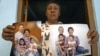 Indonesia -- Widi Yuliono a relative of John Paulisen, shows photographs of John Paulisen (Top-L), Yuli Hastini (Top-R), Arjuna Martin Paulisen (L) and Sri Paulisen (R) who are victims of the Malaysian Airline flight MH 17 plane downing in eastern Ukraine