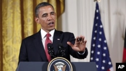 President Barack Obama speaks during a joint press conference with German Chancellor Angela Merkel (not pictured) in the White House, June 7, 2011