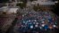 A large homeless encampment is formed on the "Plaza of the Flags" elevated park at the Santa Ana Civic Center complex, Oct. 11, 2017, in Santa Ana, California. 