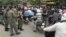 Police set up a roadblock Monday about 500 meters from the headquarters of the opposition Cambodia National Rescue Party. (Hul Reaksmey/VOA Khmer) 