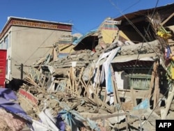 This handout photo received on Jan. 7, 2025, shows damaged houses in Shigatse, southwestern China's Tibet region, after an earthquake hit the area.