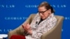 FILE - Supreme Court Justice Ruth Bader Ginsburg smiles as she answers questions from first-year students at Georgetown Law, Sept. 26, 2018, in Washington. 