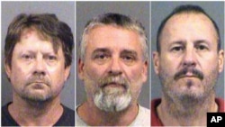 These Oct. 14, 2016 booking photos provided by the Sedgwick County Sheriff's Office in Wichita, Kansas, show, from left, Patrick Stein, Gavin Wright and Curtis Allen. They are members of a militia group and charged with plotting to bomb an apartment building housing Somali refugees in Garden City, Kansas.
