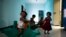 Baby girls play inside the Life Line Trust orphanage in Salem in the southern Indian state of Tamil Nadu, June 20, 2013.