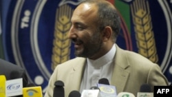 FILE - Afghanistan's National Security Adviser Haneef Atmar, at the time the country's interior minister, is seen during a press conference at the Interior Ministry in Kabul, July 18, 2009. Atmar will visit Moscow March 17 for talks with Russian Foreign Minister Sergei Lavrov.