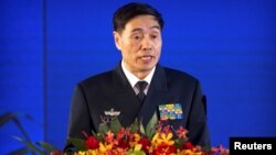 Vice Admiral Shen Jinlong, commander of the Chinese People's Liberation Army (PLA) Navy, speaks at a welcome reception for the commemoration of the 70th anniversary of the founding of the China's navy in Qingdao, Shandong province, China, April 22, 2019.