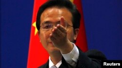 China's Foreign Ministry spokesman Hong Lei (seen here in a file photo) called the survey which found that a quarter of US firm in China face data theft, "completely irresponsible." 