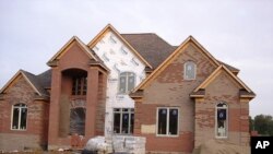 A lot of people blanch when they see a home like this rising in an older, established neighborhood with smaller homes and lower rooflines.