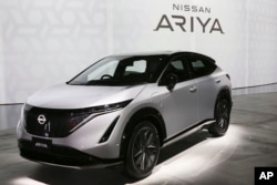 Nissan Motor Co.'s new electric crossover Ariya is displayed at Nissan Pavilion in Yokohama near Tokyo Tuesday, July 14, 2020.