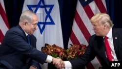 Le Premier ministre israélien Benjamin Netanyahu et le président américain Donald Trump avant une réunion lors de la 72ème session de l'Assemblée générale des Nations Unies, à New York, le 18 septembre 2017.