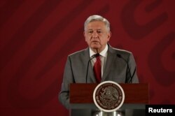 FILE - Mexico's President Andres Manuel Lopez Obrador attends a news conference at the National Palace in Mexico City, Mexico, May 31, 2019.