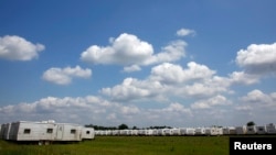 FILE - FEMA trailers await workers to evacuate them in Krotz Springs, Louisiana, May 13, 2011. 