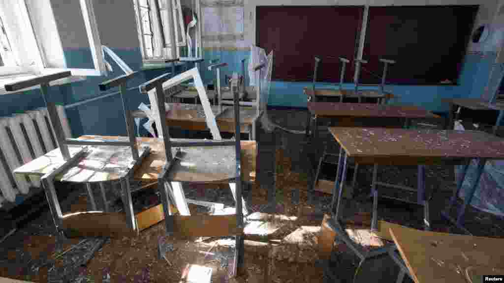 A view of a classroom of school No. 57 damaged by recent shelling in Donetsk, eastern Ukraine, Oct. 1, 2014. 