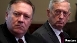 FILE - U.S. Secretary of State Mike Pompeo (L) and Secretary of Defense James Mattis are seen at a meeting at the White House, in Washington, May 17, 2018.