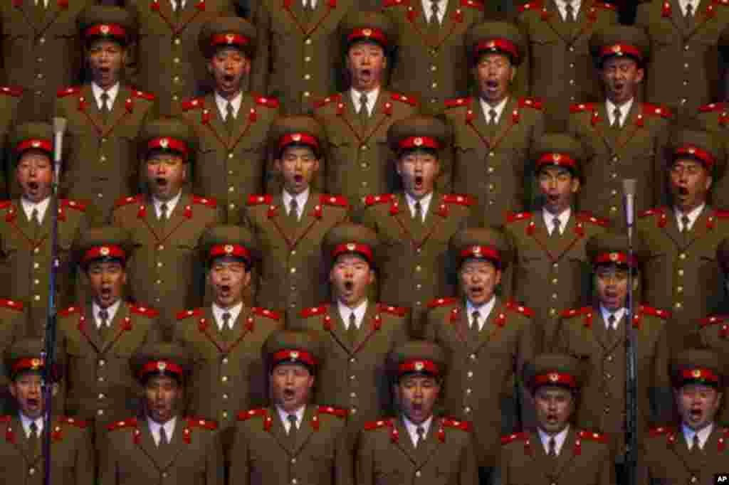 A North Korean choir sings during a concert in Pyongyang on Monday April 16, 2012 to commemorate 100 years since the birth of Kim Il Sung. (AP Photo/David Guttenfelder)