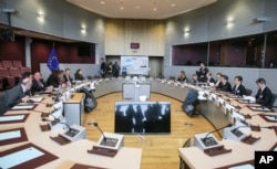 European Union, Japanese and U.S. trade officials confer at EU headquarters in Brussels, March 10, 2018. The EU is still seeking clarity from Washington about whether the 28-nation bloc will be exempt from U.S. President Donald Trump's steel and aluminum.