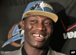 Washington Wizards second-round draft pick Hamady Ndiaye speaks to reporters during a basketball news conference introducing him to the media in Washington, June 29, 2010