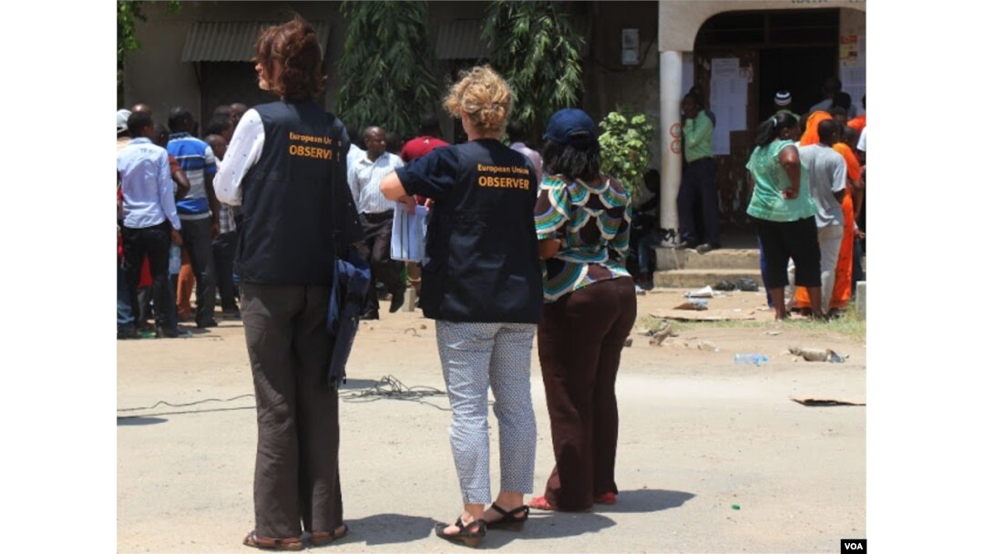 EU observers at a polling station in Dar es Salaam, Tanzania, Sunday, Oct. 25, 2015.