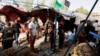 Dozens Die in Baghdad Suicide Blast Claimed by IS