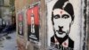 Graffiti reading "Putler kaput" is seen on a street wall in the western Ukrainian city of Lviv, May 9, 2014.