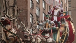 FILE - Santa Claus is seen along Central Park West during the Macy's Thanksgiving Day parade, Thursday, Nov. 28 2024, in New York. (AP Photo/Yuki Iwamura)