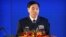 Vice Admiral Shen Jinlong, commander of the Chinese People's Liberation Army (PLA) Navy, speaks at a welcome reception for the commemoration of the 70th anniversary of the founding of the China's navy in Qingdao, Shandong province, China, April 22, 2019.