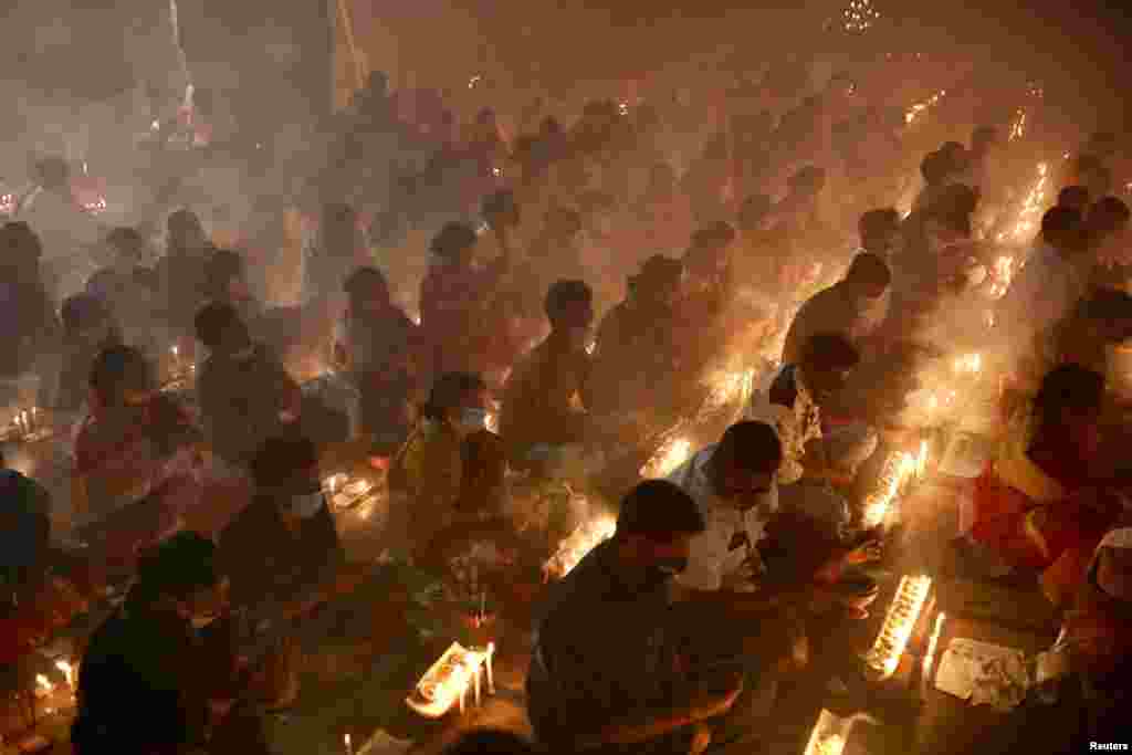 Hindu devotees observe Rakher Upabash in Narayanganj, Bangladesh, Nov. 7, 2020.