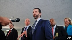 Donald Trump Jr., the son of President Donald Trump, stops to speak to members of the media after having met privately with members of the Senate Intelligence Committee on Capitol Hill, Washington, June 12, 2019.