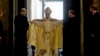 FILE - Pope Francis opens the Holy Door of St. Peter's Basilica at the Vatican, Dec. 8, 2015. 