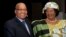 South Africa's President Jacob Zuma (L) smiles as he welcomes Malawi President Joyce Banda during a courtesy visit in Pretoria, July 31, 2012. 