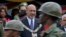 FILE - Then-Surinamese President Desi Bouterse attends a military parade after his swearing-in ceremony in Paramaribo, Suriname, on Aug. 12, 2010.
