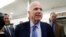 FILE - Sen. John McCain, R-Ariz., speaks to reporters as he heads to vote on budget amendments, Oct. 19, 2017, on Capitol Hill in Washington. 