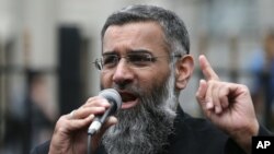 FILE - Anjem Choudary, a British Muslim social and political activist and spokesman for Islamist group, Islam4UK, speaks following prayers at the Central London Mosque in Regent's Park, London, April 3, 2015.
