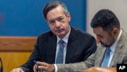 Kenneth Chesebro sits with his attorney, Manny Arora, during a hearing at which Chesebro accepted a plea deal at the Fulton County Courthouse on Oct. 20, 2023, in Atlanta, Georgia.