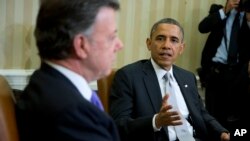 En la imagen, el presidente Obama junto a Juan Manuel Santos en la última visita de éste a EE.UU. en 2013.