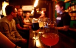 FILE - A glass of beer is pictured in a craft beer bar in Kazan, Russia, June 19, 2017.