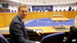 FILE - Russian opposition politician Alexei Navalny awaits a hearing in his case at the European Court of Human Rights, in Strasbourg, France, Nov.15, 2018.