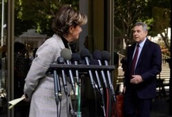 Attorney Gloria Allred, who represents several of Harvey Weinstein's accusers, makes way for Weinstein's attorney Mark Werksman at a news conference following an arraignment for the convicted rapist July 21, 2021.