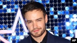 ARCHIVO - El cantante Liam Payne posa para los fotógrafos a su llegada a la Global Gift Gala en Londres, el 7 de marzo de 2019.