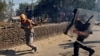 Indian Farmers Clash with Police as They Protest New Laws