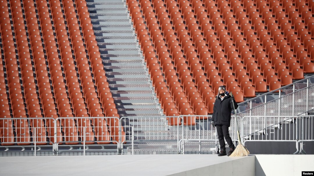 A worker is seen at the Olympic Stadium, venue for the opening and closing ceremonies of the 2018 Pyeongchang Winter Olympic Games in Pyeongchang, South Korea, Dec. 12, 2017.