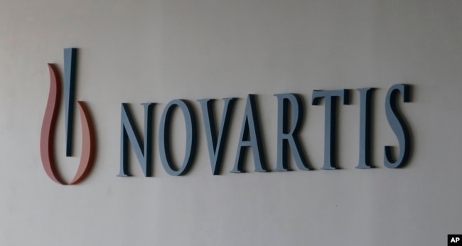 FILE - In a Saturday, Aug. 13, 2016 file photo, logo of Swiss pharmaceutical company Novartis is seen at the Novartis Korea office in Seoul, South Korea. (AP Photo/Ahn Young-joon, File)