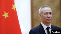 FILE - Chinese Vice Premier Liu He attends the EU-China High-level Economic Dialogue at Diaoyutai State Guesthouse in Beijing, China, June 25, 2018. He is to meet his U.S. counterparts in Washington next week.