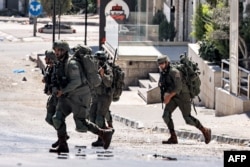 Israeli army soldiers deploy in Tubas in the north of the occupied West Bank on Sept. 11, 2024 amid an ongoing large-scale Israeli military operation in the Palestinian territories.