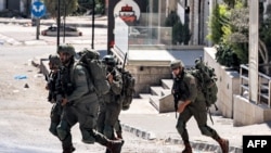 Israeli army soldiers deploy in Tubas in the north of the occupied West Bank on Sept. 11, 2024 amid an ongoing large-scale Israeli military operation in the Palestinian territories. 