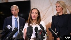 Stella Assange (C), the wife of WikiLeaks founder Julian Assange, speaks at a press conference next to lawyer Jennifer Robinson (R) in Canberra on June 26, 2024, after he pleaded guilty at a US court in Saipan to a single count of conspiracy to obtain and