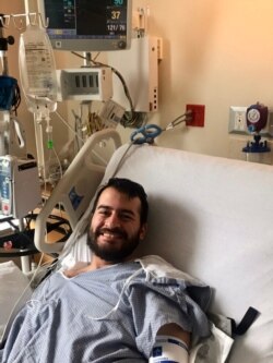 Francis Wilson smiles after waking up from a 10-day coma and being taken off a ventilator.