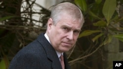 FILE - Britain's Prince Andrew is photographed on Aug. 11, 2021. The prince will face a civil sex abuse trial in the U.S. and has been removed from his royal duties. (Neil Hall/PA via AP, File)